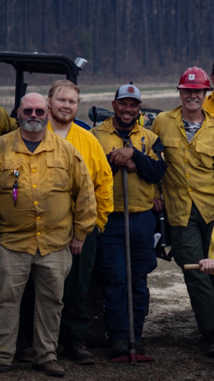 A photo of the team behind a successful prescribed burn on a private landowner's property in Georgia