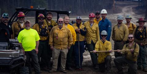 A photo of the team behind a successful prescribed burn on a private landowner's property in Georgia
